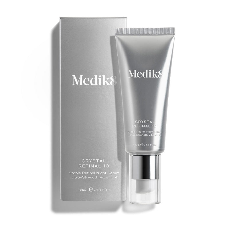 Mediks Crystal Retinal 3 retinol night serum in a silver squeeze tube with a clear cap, shown next to its matching silver box on a white background.