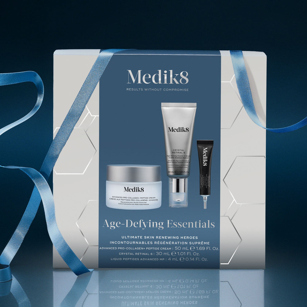 Medik8 Age-Defying Essentials festive gift set with Advanced Pro-Collagen+ Peptide Cream, Crystal Retinal 6 and Liquid Peptides Advanced MP